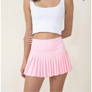 Gold Hinge Baby Pink Pleated Tennis Skirt
Size XS